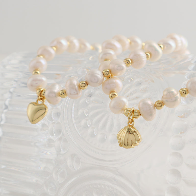 Wholesale Fashion Custom Women Gift Gold Plated Brass Beads Handmade Elastic Shell Heart Charm 7mm Freshwater Pearl Bracelet
